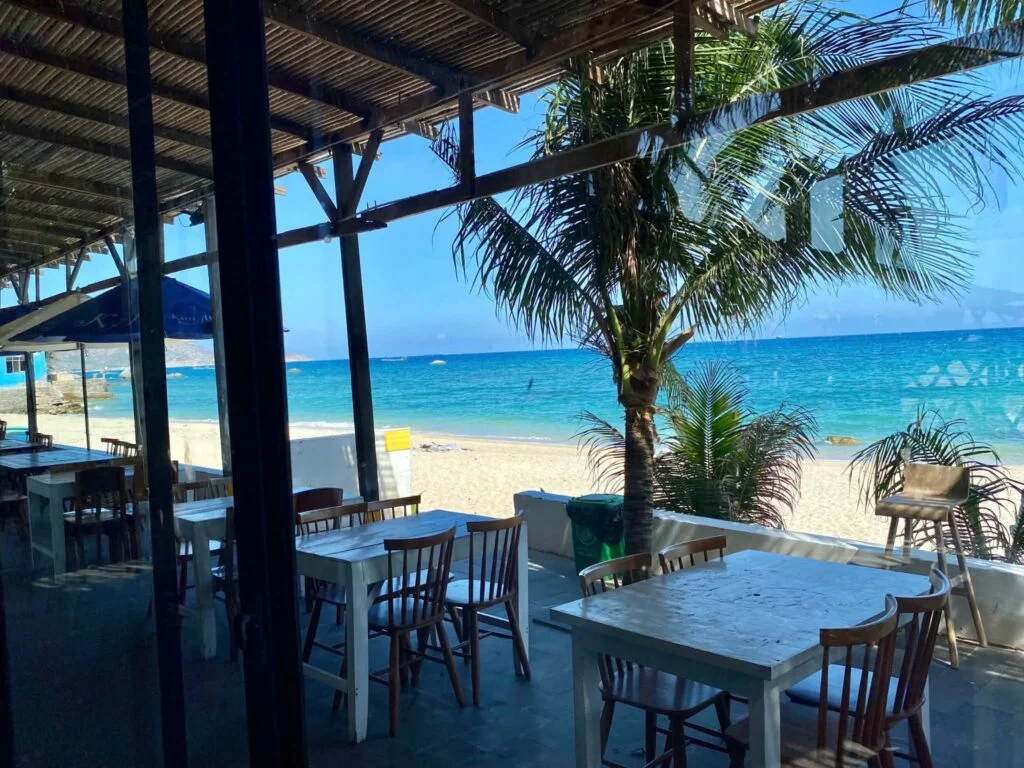 Beachfront terrace seating beside the sea